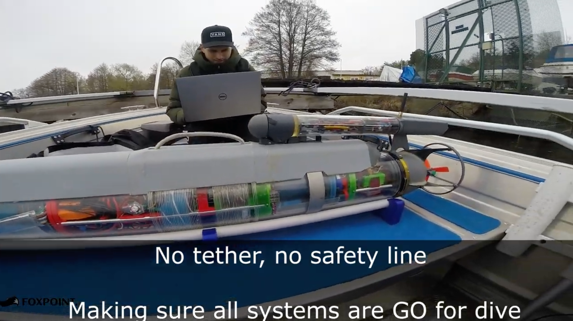 Sitting in a boat, making final adjustmenst before the first untethered mission